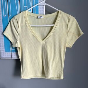 Yellow cropped v neck top